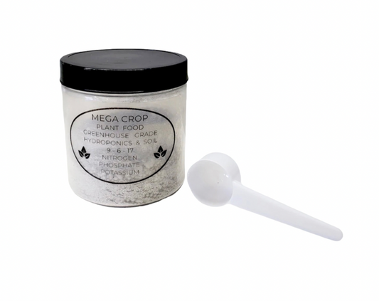 Mega Plant Nutrients with a scoop
